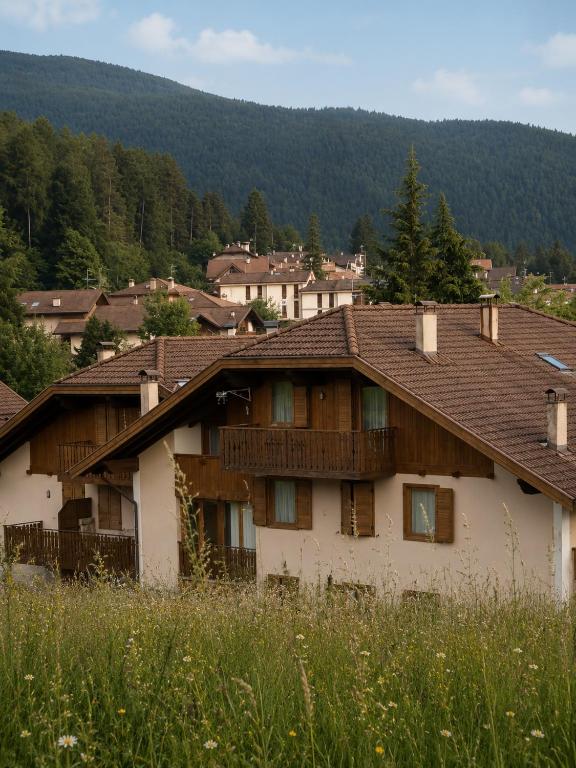 Appartamento ROEN a Cavareno circondato dal paesaggio di montagna